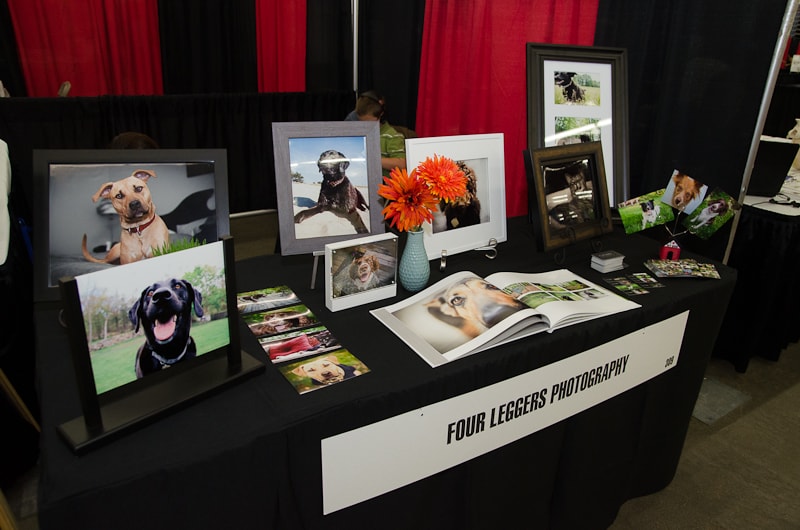 Pet expo table with albums and products