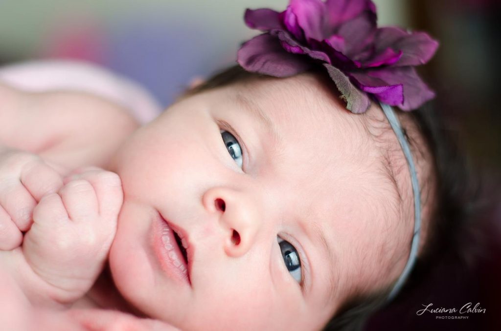 Baby girl with purple headband