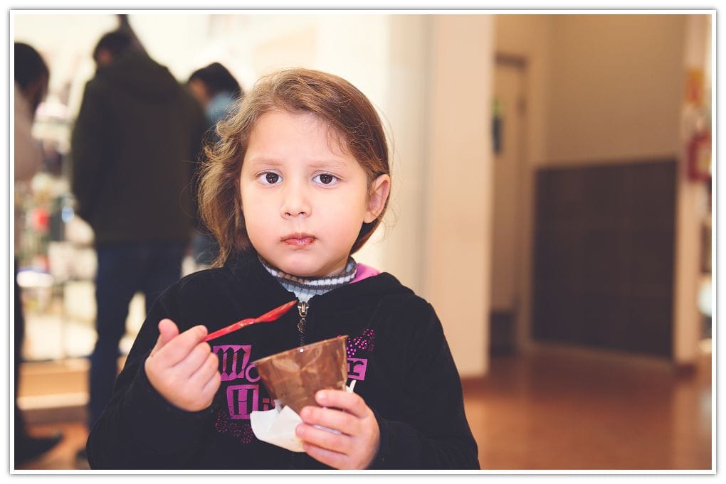 girl eating chocolate ice cream