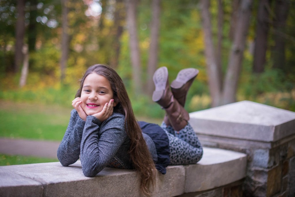 girls seating on bridge at Walpole park