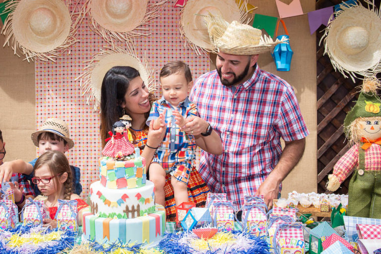 baby and parents singing happy birthday