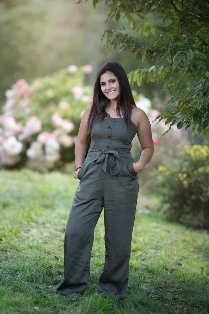 Senior portrait in a garden with roses summer near chelmsford, ma