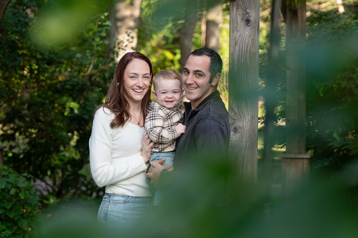 Family of three in autumn in Benson Park Hudson, Nh