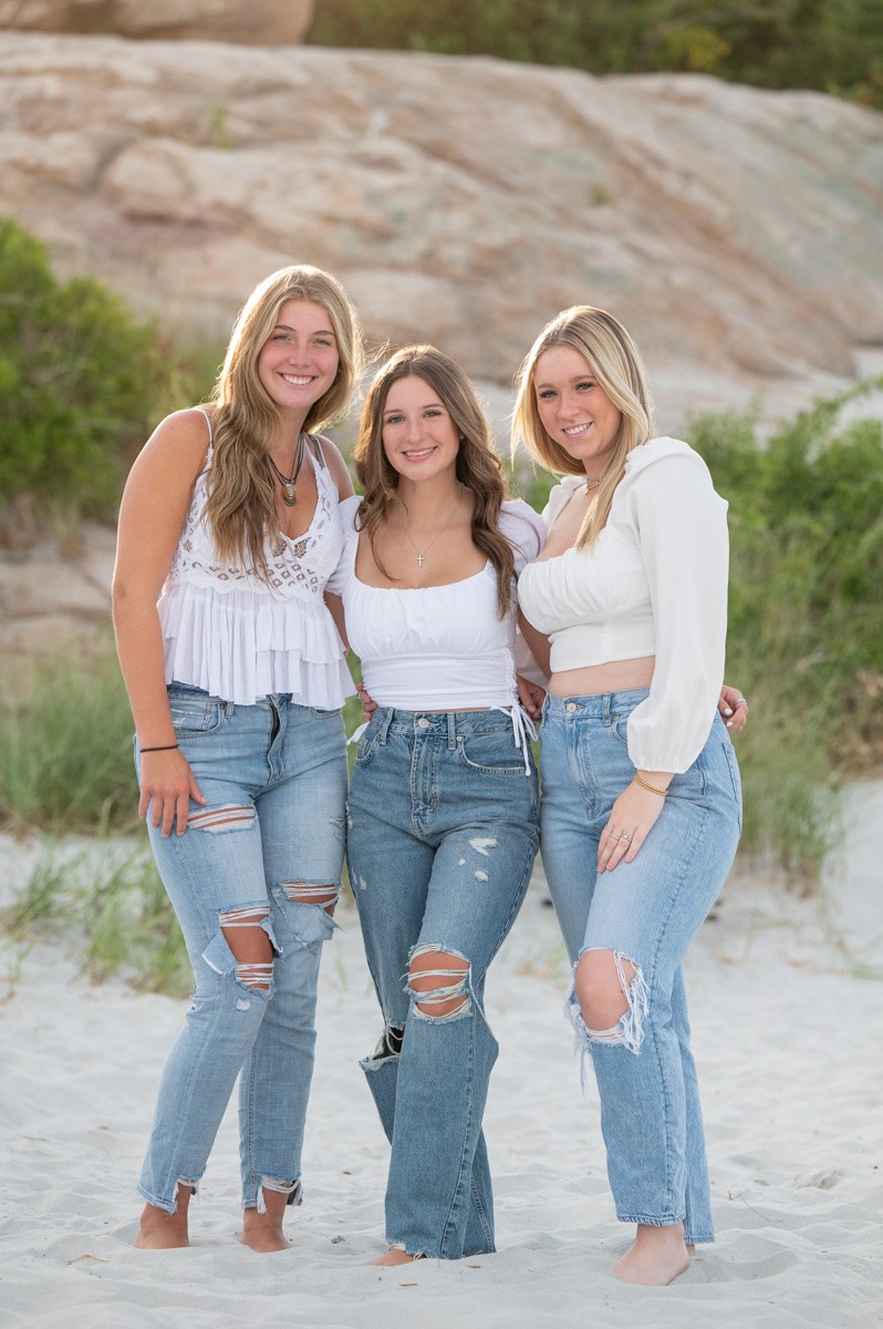 Three high school senior girls photographed together at Wingaersheek Beach, Gloucester Massachusetts